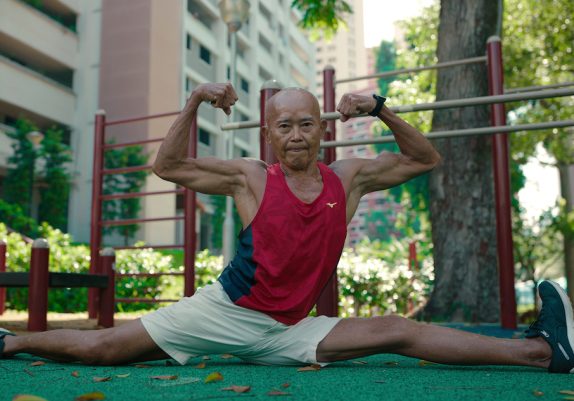 Elderly Man Showing Muscles