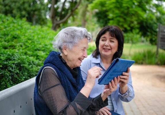 Old women reading a newspaper